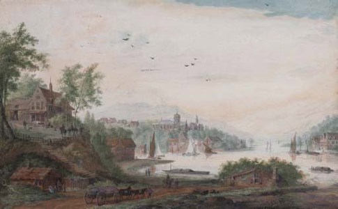 View of a riverside town with shipping and barges