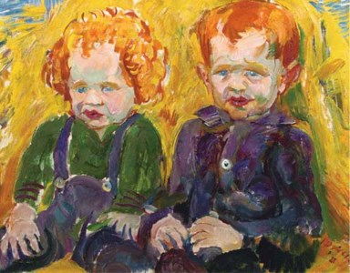 Two children by a haystack