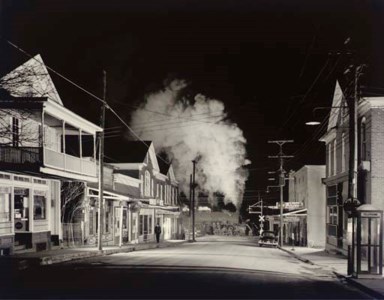 Policeman Weldon Painter patrols the Main Street of Stanley, Georgia, 1956