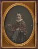 including two of siblings wearing plaid and third apparently depicting