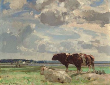 Cows grazing on a marsh