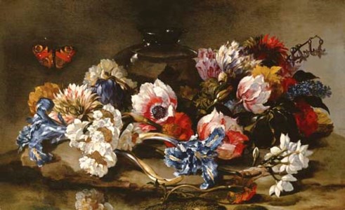 Lilacs, roses, irises and other flowers on a stone ground with a glass vase and a peacock butterfly