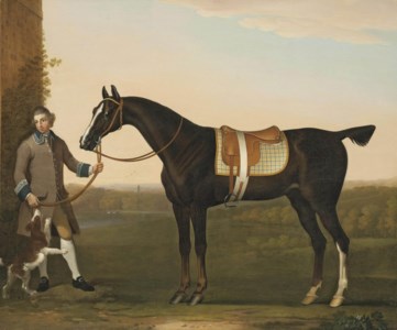 A hunter held by a groom with a dog, in a wooded landscape