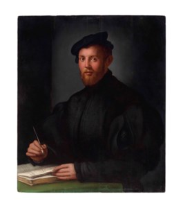 Portrait of a young man with a book