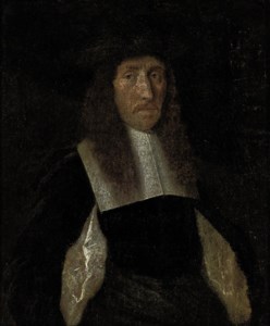 Portrait of a gentleman, half-length, in a black slashed doublet and black hat