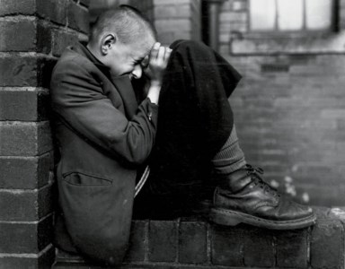 Youth on wall, Tyneside, 1976