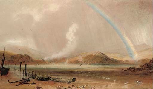 A rainbow over a Welsh estuary, a squall approaching