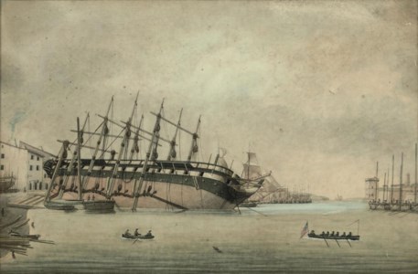A frigate beached and under repair in a dockyard at Marseilles