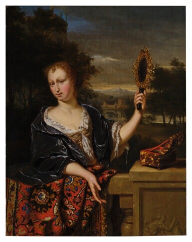 Elegant lady with a mirror