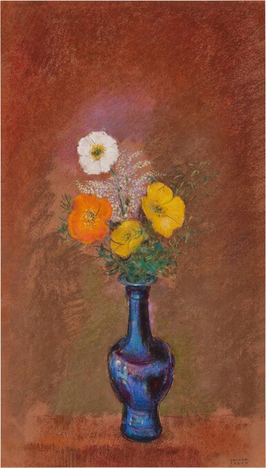 Fleurs dans un vase bleu