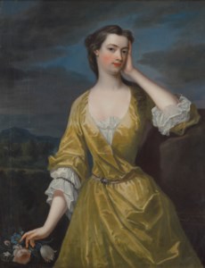 Portrait of Lady Elizabeth Egerton, Countess of Bridgewater (1687-1714), three-quarter-length, in a yellow dress, a landscape beyond