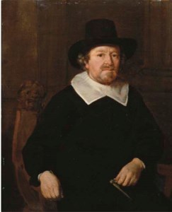 Portrait of a gentleman, three-quarter-length, in a black costume with white collar and black hat, seated with a compass in his left hand