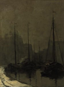 Moored vessels along a quay in winter