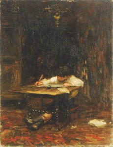 A young boy studying