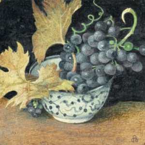Still life with a bunch of grapes and vine leaves in a chinoiserie bowl