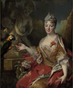 Portrait of a woman with a macaw