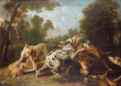 Dogs fighting in a wooded clearing