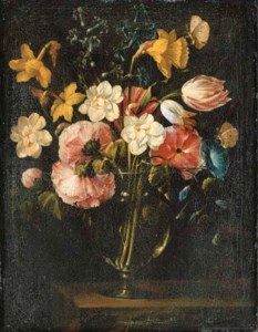 Roses, clematis, a tulip and other flowers in a glass vase on a wooden ledge with a butterfly