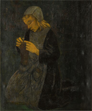 Jeune bretonne tricotant 