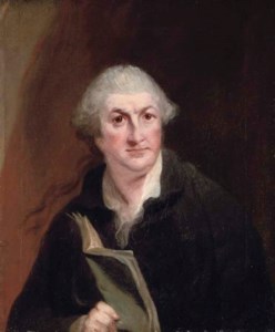 Portrait of David Garrick (1717-1779), half-length, in a black coat and wig, holding an open copy of Macbeth