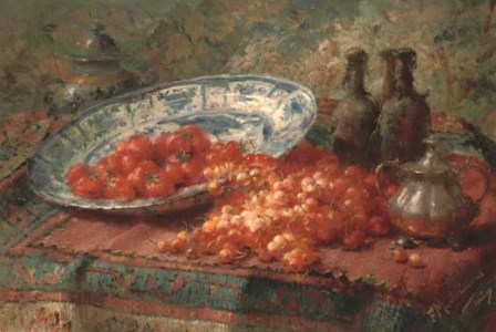 Stawberries in a delft bowl with cherries on a table
