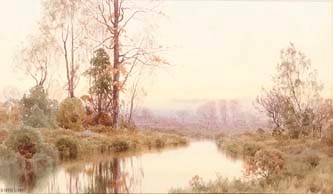 Dawn breaking over a river landscape