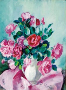 A vase of pink and red roses