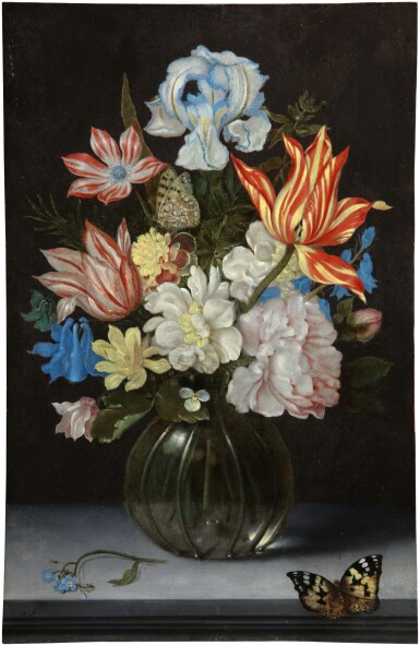 Still life of striped tulips, roses, a French marigold, blue columbines, a poppy anemone, an iris and other flowers in a globular glass vase with butterflies