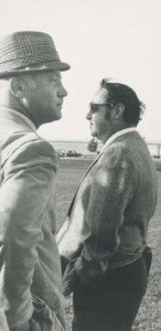 Situation, 1980s (2 men, 1 with hat, 1 with sunglasses)