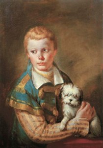 Portrait of a young boy with a dog