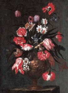 Tulips, carnations, daffodils and other flowers in a sculpted vase