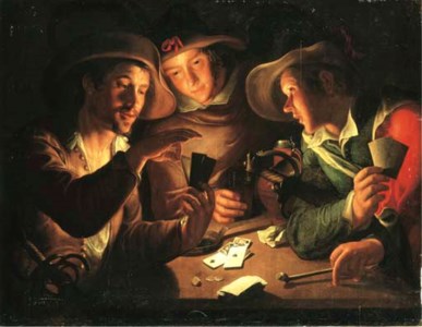Soldiers playing cards by candlelight