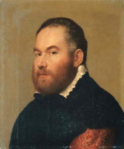Portrait of a gentleman, bust-length in a brocaded red velvet doublet with a black cloak and a white collar