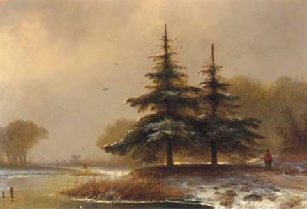 A sportsman on a wooded riverbank in winter