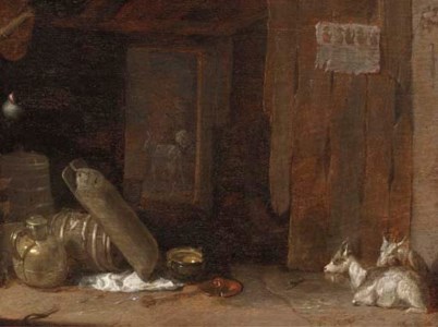 A barn interior with goats and a lady milking a goat beyond