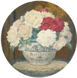 Red and white roses in a bowl before a Chinese lacquer screen