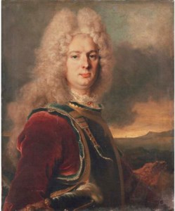 Portrait of a gentleman, bust-length, in a blue, gold and purple velvet coat, his hat in his right hand, in a landscape