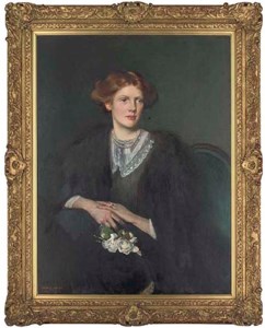 Portrait of Audrey Innes, neé Broadwood, wife of John Alfred Innes, seated three-quarter-length, in a lace trimmed dress and fur wrap