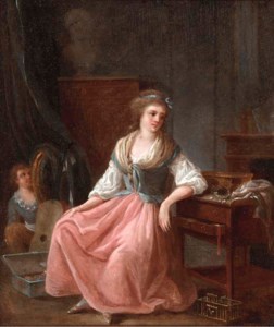 A seated young woman by her dressing table