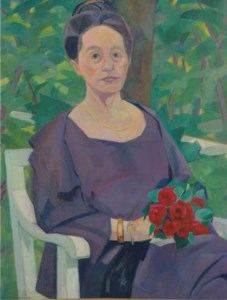Portrait of a woman holding red roses