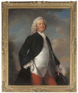 Portrait of Sir Watkin William Wynn (1692-1749), 3rd Bt., three-quarter length in a dark blue coat and red trousers