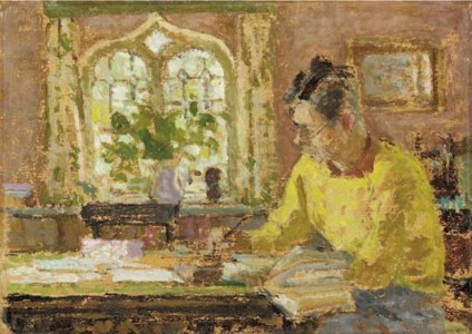 Raymond Mortimer, writing at a table in the study of The Bothy, Culham Court, Henley-on-Thames