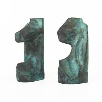 A pair of green-patinated bronze sculptures/bookends, signed and numbered 4/100.