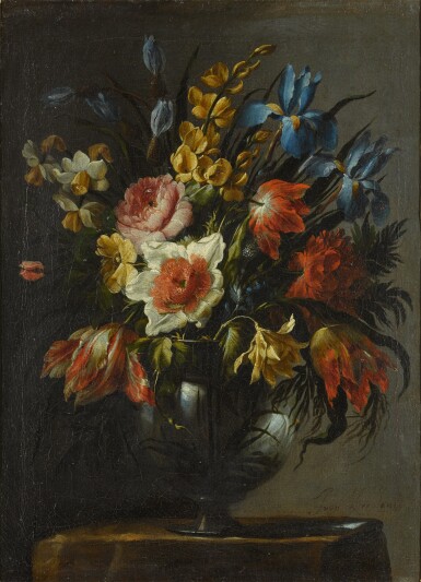 Still life of flowers, including tulips, iris and narcissi, in a glass vase