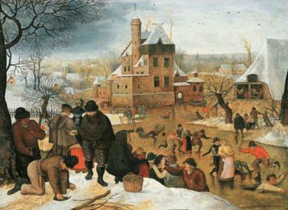 A winter landscape with peasants skating and playing kolf on a frozen river, a town beyond
