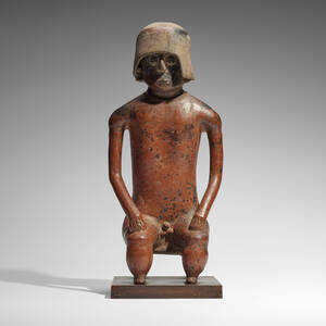 Seated figure