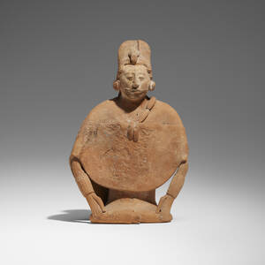 Seated figure