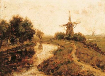 Windmills by a river