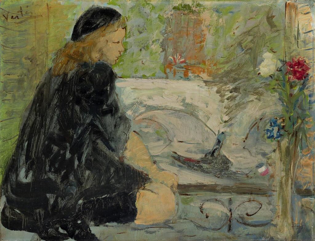 Femme assise sur un balcon, vue sur la Seine