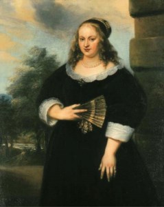 Portrait of a Lady, three-quarter-length, in a black dress with a white lace collar and cuffs, a fan in her right hand, a garden beyond
